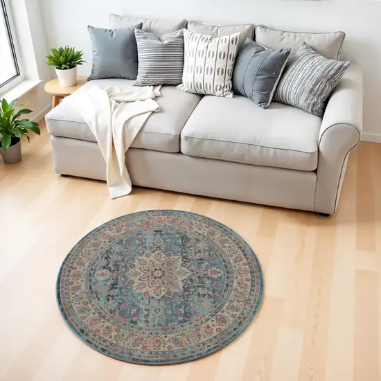 4' Blue And Beige Floral Distressed Round Rug Photo 1