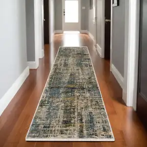 Photo of 8' Blue And Gold Abstract Runner Rug With Fringe