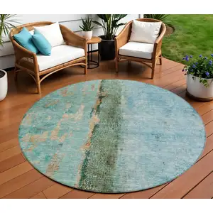 Photo of 8' Blue And Gold Round Abstract Washable Indoor Outdoor Area Rug