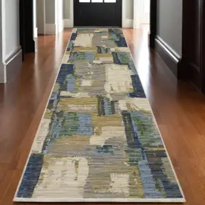 Photo of 12' Blue And Green Abstract Runner Rug With Fringe