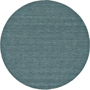 Photo of 8' Blue And Green Round Wool Hand Woven Stain Resistant Area Rug