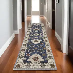 Photo of 8' Blue And Ivory Floral Runner Rug With Fringe