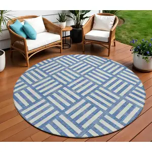 Photo of 8' Blue And Ivory Round Geometric Washable Indoor Outdoor Area Rug