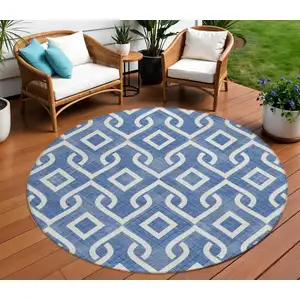 Photo of 8' Blue And Ivory Round Geometric Washable Indoor Outdoor Area Rug