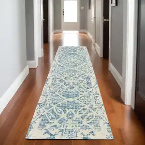 Photo of 8' Blue And Ivory Wool Geometric Hand Tufted Runner Rug