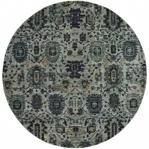 Photo of 8' Blue And Navy Round Oriental Power Loom Stain Resistant Area Rug