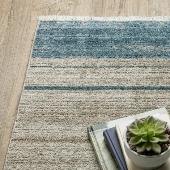 8' Blue Dark Blue Teal Grey Ivory Beige And Tan Geometric Power Loom Runner Rug With Fringe Photo 6