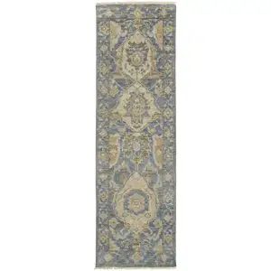 Photo of 8' Blue Gold And Tan Wool Floral Hand Knotted Stain Resistant Runner Rug With Fringe