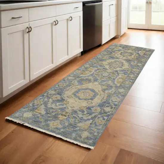 8' Blue and Gold Wool Floral Hand Knotted Runner Rug With Fringe Photo 1