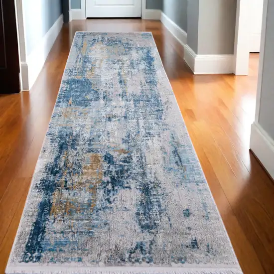 10' Blue Gold and Gray Abstract Power Loom Runner Rug With Fringe Photo 1