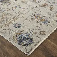 Photo of 10' Blue Gray and Brown Floral Power Loom Worn Faded Runner Rug With Fringe