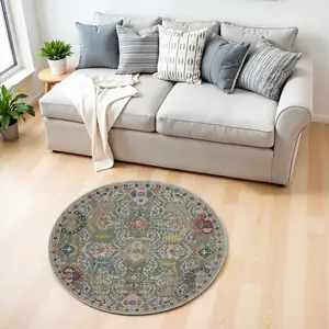 Photo of 6' Blue Gray and Green Floral Distressed Non Skid Round Rug