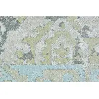 Photo of 8' Blue Green and Gray Floral Power Loom Worn Faded Round Rug