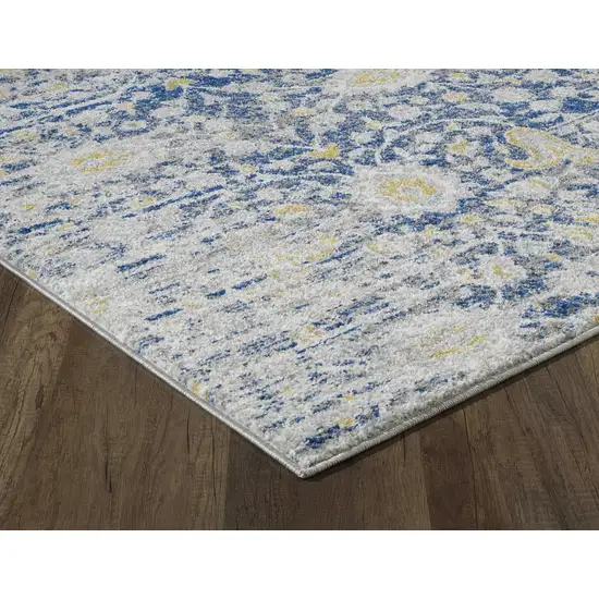 7' Blue Grey Machine Woven Distressed Floral Indoor Runner Rug Photo 1