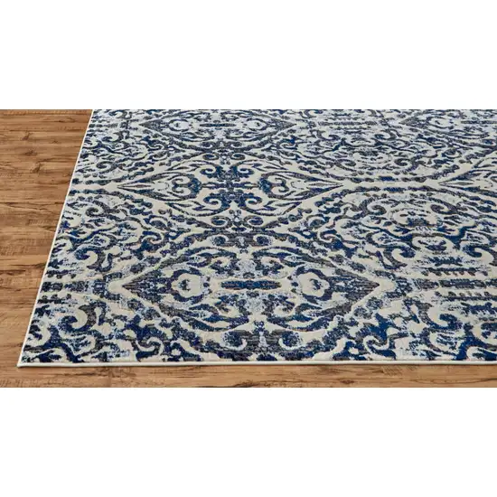 8' Blue Ivory And Black Floral Distressed Stain Resistant Runner Rug Photo 1