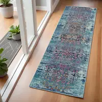 Photo of 6' Blue Red And Orange Floral Distressed Runner Rug