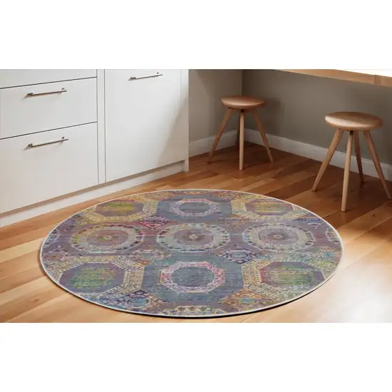 6' Blue Red and Orange Geometric Distressed Non Skid Round Rug Photo 1