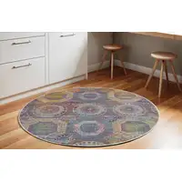 Photo of 6' Blue Red and Orange Geometric Distressed Non Skid Round Rug