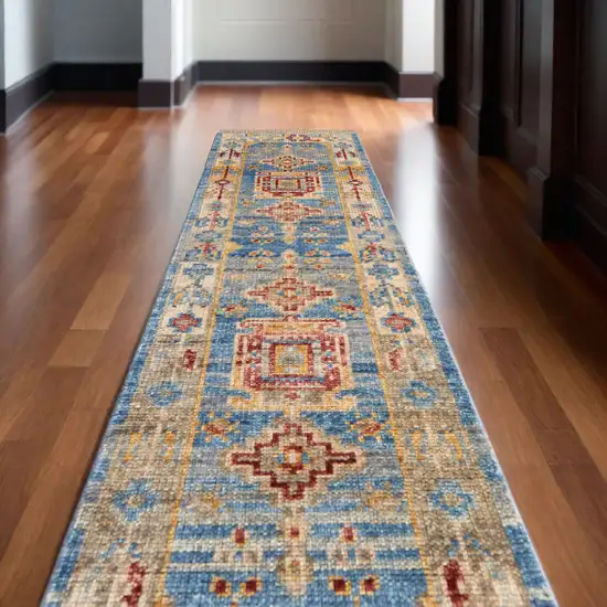 10' Blue Red and Yellow Wool Geometric Hand Knotted Runner Rug With Fringe Photo 1