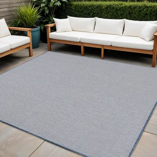 8' Blue and Ivory Indoor Outdoor Area Rug Photo 1