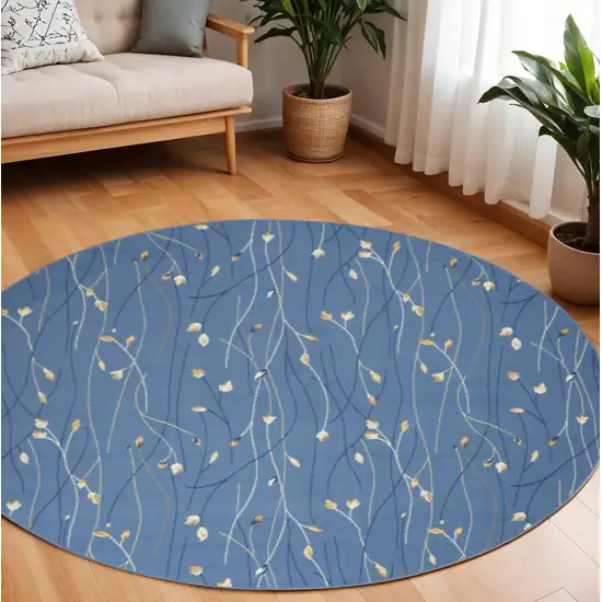 8' Blue and Beige Round Floral Power Loom Area Rug Photo 1