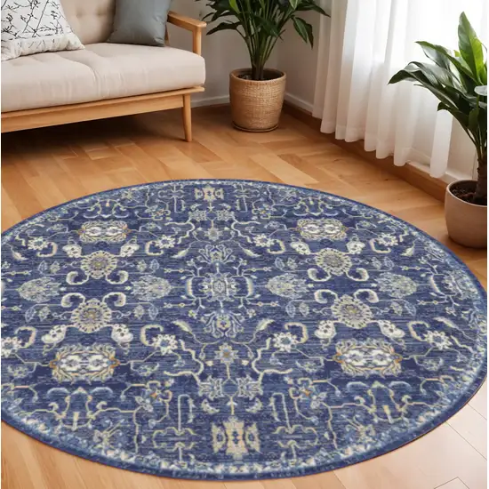 8' Blue and Beige Round Floral Power Loom Area Rug Photo 1