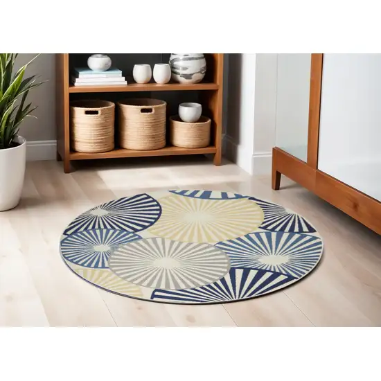 5' Blue and Beige Round Geometric Power Loom Area Rug Photo 1