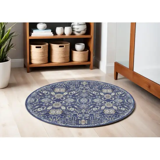 5' Blue and Gold Round Oriental Power Loom Area Rug Photo 1