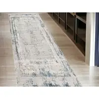 Photo of 10' Blue and Gray Abstract Washable Non Skid Area Rug