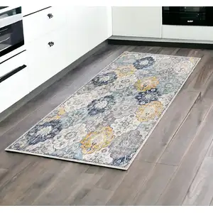 Photo of 8' Blue and Gray Round Floral Washable Non Skid Area Rug