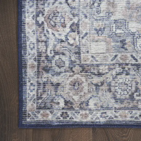 8' Blue and Ivory Floral Power Loom Distressed Washable Runner Rug Photo 1