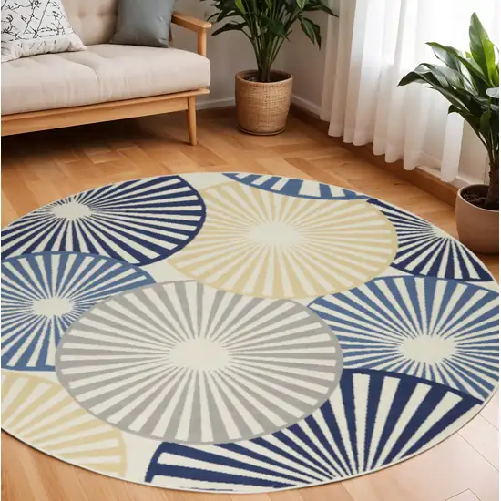 8' Blue and Ivory Round Geometric Power Loom Area Rug Photo 1