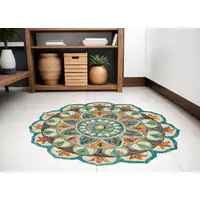 Photo of 5' Blue and Ivory Round Wool Floral Hand Tufted Area Rug