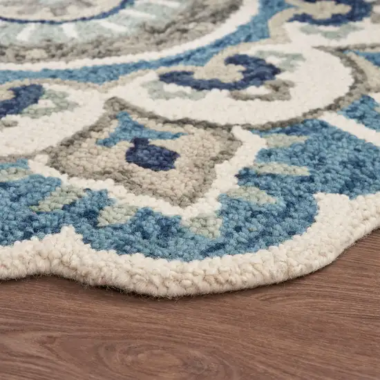 5' Blue and Ivory Round Wool Floral Hand Tufted Area Rug Photo 7