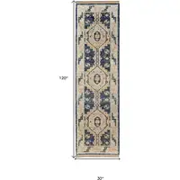 Photo of 10' Blue and Ivory Wool Geometric Hand Knotted Runner Rug With Fringe