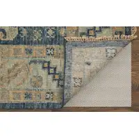 Photo of 14' Blue and Ivory Wool Geometric Hand Knotted Runner Rug With Fringe