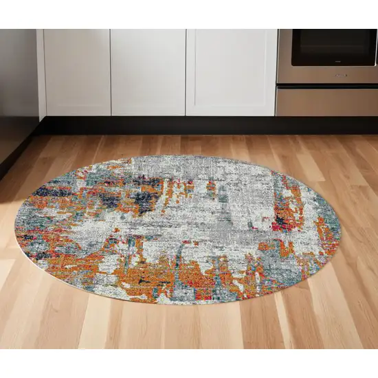 7' Blue and Orange Round Abstract Power Loom Area Rug Photo 1