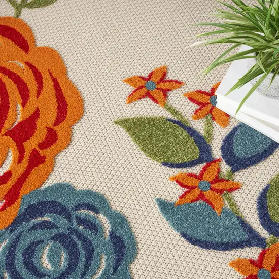 8' Blue and Orange Round Floral Power Loom Area Rug Photo 6