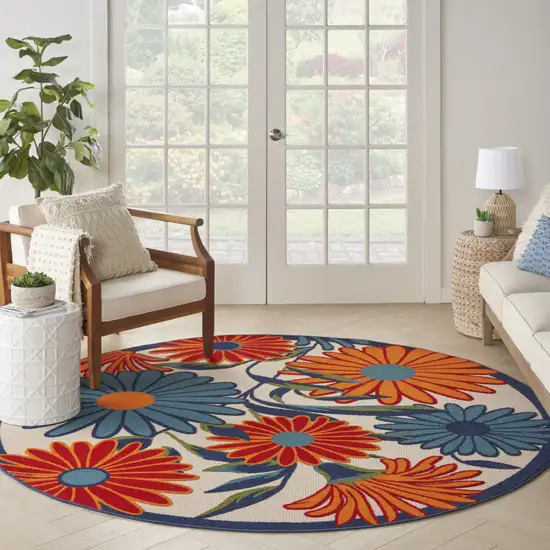 8' Blue and Orange Round Floral Power Loom Area Rug Photo 9