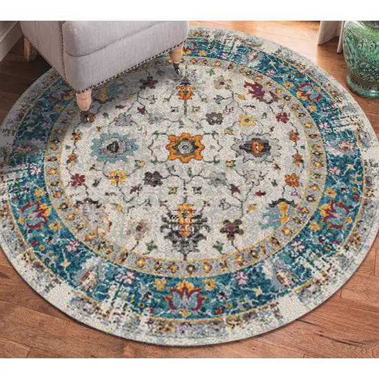 7' Blue and Orange Round Floral Power Loom Area Rug Photo 5