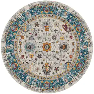 Photo of 7' Blue and Orange Round Floral Power Loom Area Rug