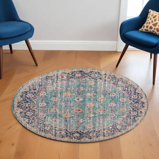 6' Teal Navy and Orange Floral Power Loom Worn Faded Round Rug Photo 1