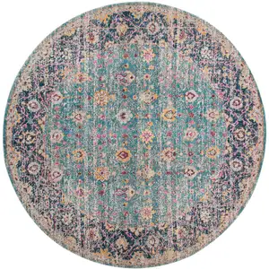 Photo of 6' Blue and Orange Round Floral Power Loom Distressed Area Rug