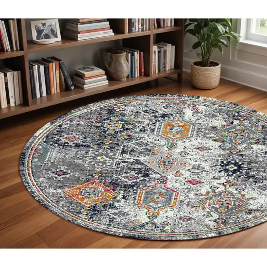 7' Blue and Orange Geometric Power Loom Round Rug Photo 1