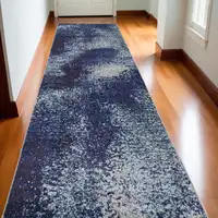 Photo of 10' Blue and Purple Abstract Power Loom Runner Rug