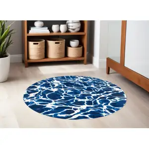 Photo of 5' Blue and White Round Abstract Non Skid Area Rug