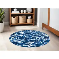 Photo of 5' Blue and White Round Abstract Non Skid Area Rug