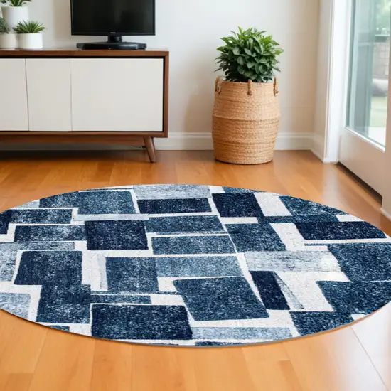 8' Blue and White Round Geometric Non Skid Area Rug Photo 1