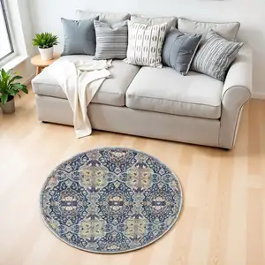 Photo of 4' Blue and Yellow Floral Distressed Non Skid Round Rug