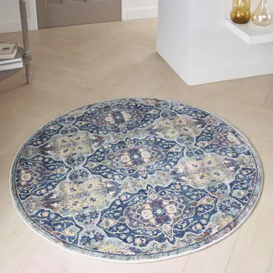 4' Blue and Yellow Floral Distressed Non Skid Round Rug Photo 9